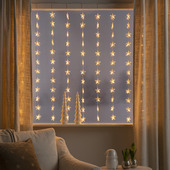 Konstsmide LED gordijn 120 sterren 1,4x1,2m 120x extra warmwit, 30v, transp kabel, indoor